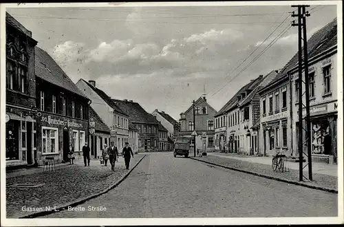 Ak Jasień Gassen Ostbrandenburg, Breite Straße, Geschäfte