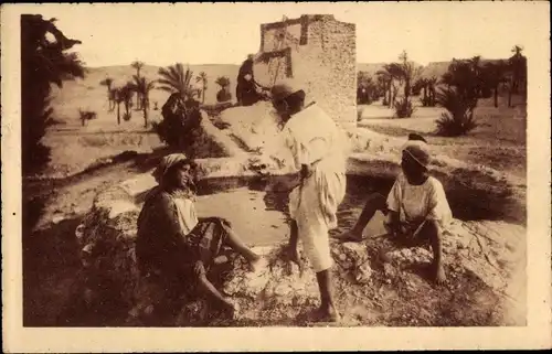 Ak Madanīn Medenine Tunesien, Jeunes indigenes pres d'un puits