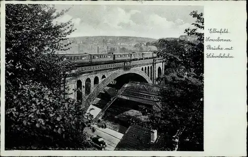 Ak Elberfeld Wuppertal, Sonnborner Brücke mit Schwebebahn, Zug