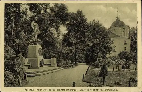 Ak Zittau in der Oberlausitz, Park m. König Albert Denkmal, Stadtgärtnerei u. Blumenuhr