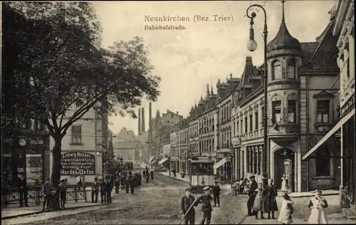 Ak Neunkirchen im Saarland, Blick in die Bahnhofstraße, Straßenbahn, Ofenhandlung Ludwig Becker