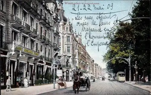 Ak Wiesbaden in Hessen, Wilhelmstraße, Hotel,  Straßenbahn, Kutsche