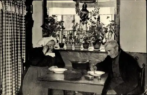 Ak Nordbrabant Niederlande, Brabantsch Dorpsleven, Paar am Tisch