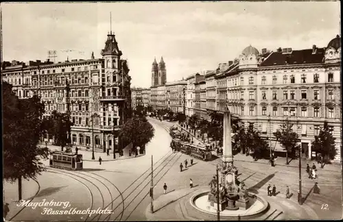 Ak Magdeburg an der Elbe, Hasselbachplatz, Denkmal, Straßenbahnen