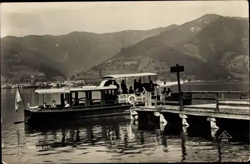 Ak Zell am See in Salzburg, Rundfahrt, Motorboot, Anlegestelle, Landschaftspanorama