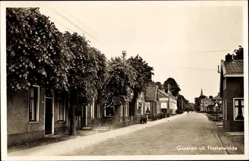 Ak Finsterwolde Groningen, Dorfstraße, Häuser