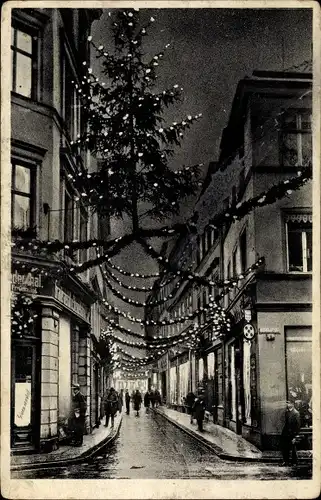 Ak Magdeburg an der Elbe, Straßenschmuck zur Weihnachtszeit, Nachtbeleuchtung