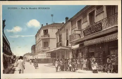 Ak Oujda Marokko, Rue du Maréchal, Tabac Journeaux Librairie Papeterie