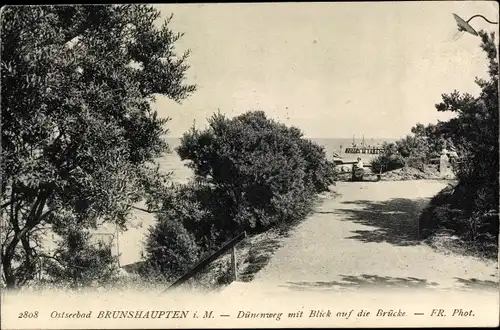 Ak Ostseebad Brunshaupten Kühlungsborn, Dünenweg mit Blick auf die Brücke