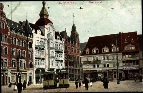 Ak Halberstadt am Harz, Fischmarkt, Geschäft Krüger-Oberbeck, Straßenbahnen