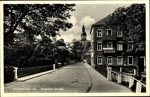 Ak Königsbrück der Oberlausitz, Dresdner Straße, Brücke, Wohnhäuser, Kirche