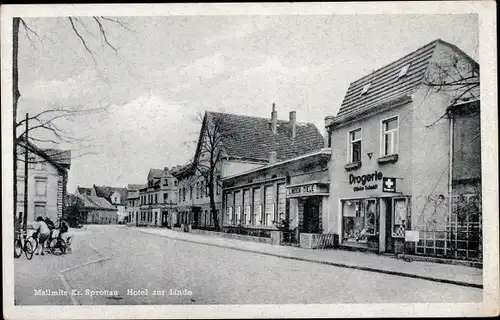 Ak Małomice Mallmitz in Schlesien, Hotel zur Linde, Drogerie, Apotheke