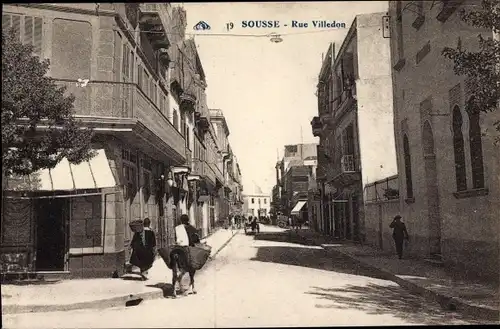 Ak Sousse Tunesien, Rue Villedon, Straßenpartie im Ort, Esel, Häuser