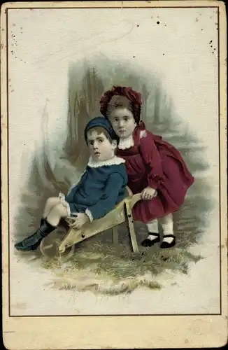 Ak Mädchen schiebt Jungen in einer Schubkarre