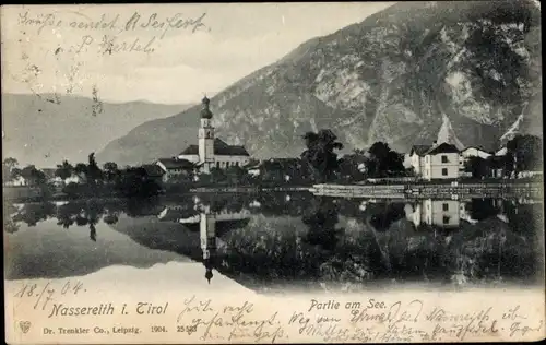 Ak Nassereith in Tirol, Partie am See, Blick auf den Ort, Kirche