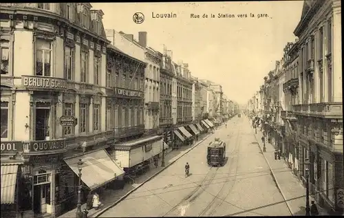 Ak Louvain Leuven Flämisch Brabant, Rue de la Station, Straßenbahn, Quo Vadis, Berlitz School