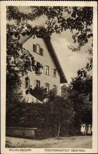 Ak Wilhelmsdorf in Württemberg, Straßenpartie mit Blick auf das Töchterinstitut Siegfried