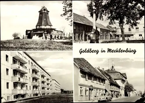 Ak Goldberg in Mecklenburg, Straßenpartie, Mühle, Denkmal, Wohnblöcke