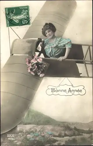 Ak Glückwunsch Neujahr, Frau in einem Flugzeug