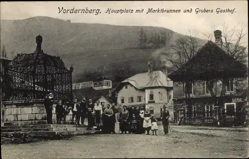 Ak Vordernberg Steiermark, Hauptplatz mit Marktbrunnen und Grubers Gasthof