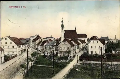 Ak Ostritz in der Oberlausitz, Kirche, Wohnhäuser