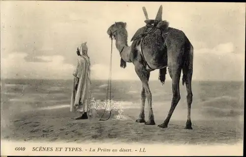 Ak Scenes et Types, La Priere au desert, betender Araber mit Kamel in der Wüste, Maghreb