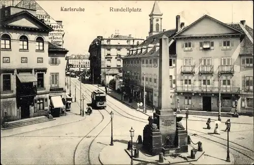 Ak Karlsruhe in Baden, Rundellplatz, Denkmal, Straßenbahn