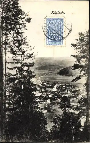 Ak Köflach Steiermark, Blick auf den Ort durch Bäume