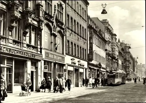 Ak Gera in Thüringen, Sorge mit Straßenbahn, Haltestelle, Buchhandlung, Haus des Herrn, Palast