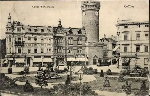 Ak Cottbus, Kaiser Wilhelmplatz, Turm, Geschäft J. Zimmermann, J. Neumann