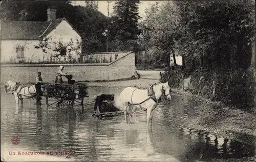 Ak Un Abreuvoir au Village