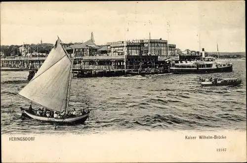 Ak Ostseebad Heringsdorf auf Usedom, Kaiser Wilhelm-Brücke, Segelboot, Dampfschiff