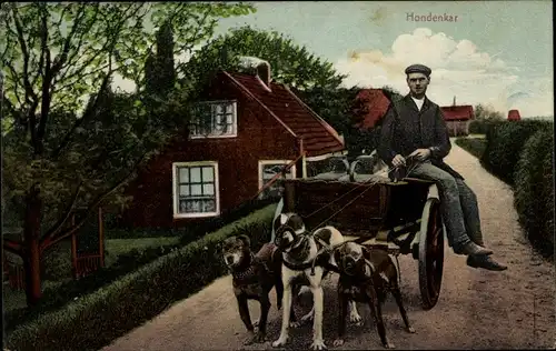 Ak Niederlande, Hondenkar, Mann mit Hundekarren
