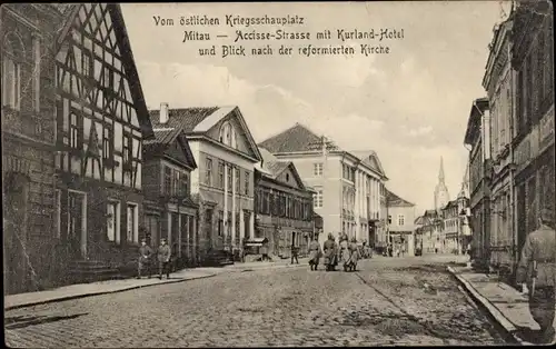 Ak Jelgava Mitau Lettland, Accisse Straße mit Kurland Hotel und Blick nach der reformierten Kirche