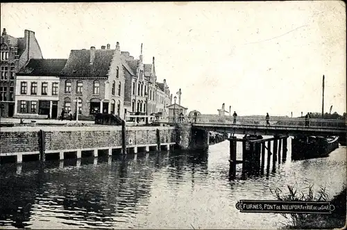 Ak Furnes Veurne Westflandern, Pont de Nieuport et Rue de la Gare, Flusspartie mit Brücke