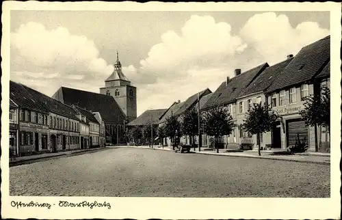 Ak Osterburg in der Altmark in Sachsen Anhalt, Marktplatz, Geschäft, Inh. Carl Hüttinger