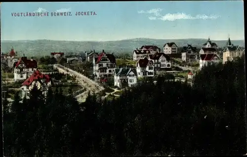 Ak Jocketa Pöhl Vogtland, Blick über den Wald zum Ort