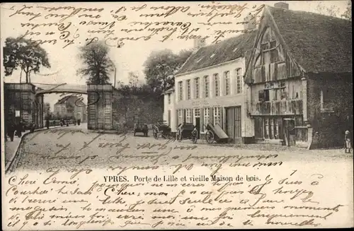 Ak Ypres Westflandern, Porte de Lille et vieille maison de bois