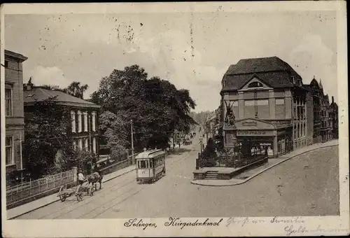 Ak Solingen in Nordrhein Westfalen, Kriegerdenkmal, Straßenbahn