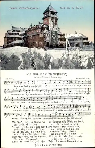 Ak Oberwiesenthal im Erzgebirge, Neues Fichtelberghaus, Winter, Lied Willkumme offen Fichtelbarg