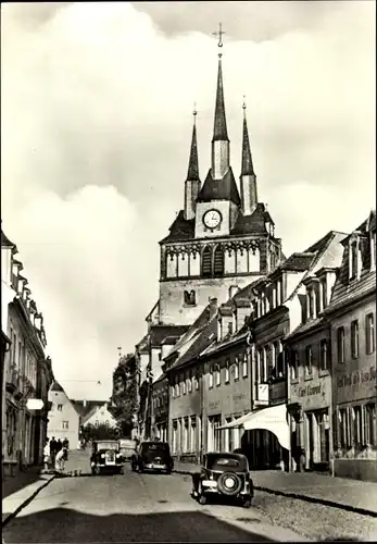 Ak Lommatzsch in Sachsen, Straßenpartie, Kirche