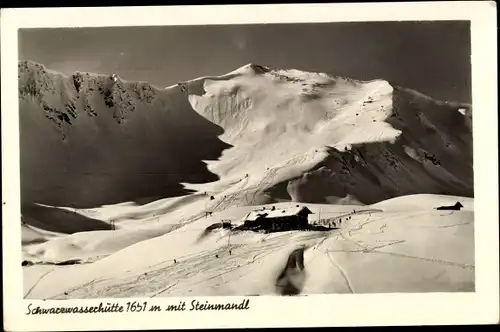 Ak Vorarlberg Österreich, Blick auf die Schwarzwasserhütte mit Steinmandl
