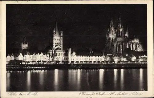 Ak Köln am Rhein, bei Nacht, Rheinufer, Rathaus, St. Martin, Dom