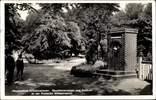 Ak Wilhelmshaven an der Nordsee, Gezeitenanzeiger und Badeuhr an der Postecke