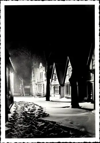 Ak Warnemünde Rostock, Straßenpartie bei Nacht im Winter