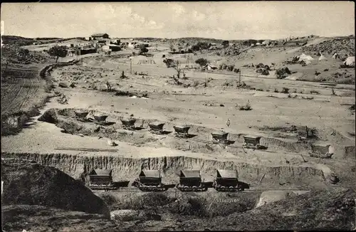 Foto Bergbau, Förderwagen, Ortschaft in Afrika