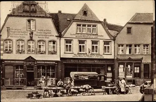 Ak Sankt Wendel Saarland, Häuser mit Bekenntnissprüchen am Domplatz, Marktstände