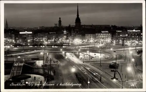 Ak Stockholm Schweden, Vy över Slussen i kvällsbelysning
