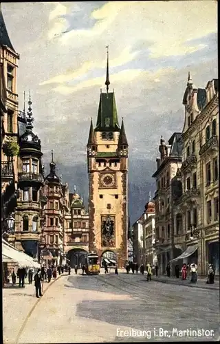 Künstler Ak Freiburg im Breisgau, Martinstor, Straßenbahn