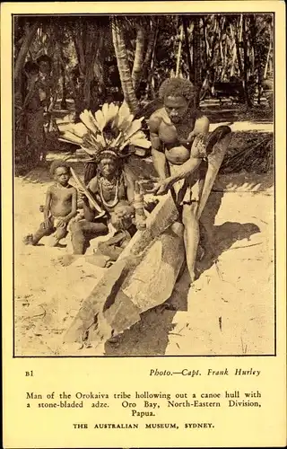 Ak Oro Bay Papua Neuguinea, Man of the Orokaiva tribe hollowing out a canoe hull